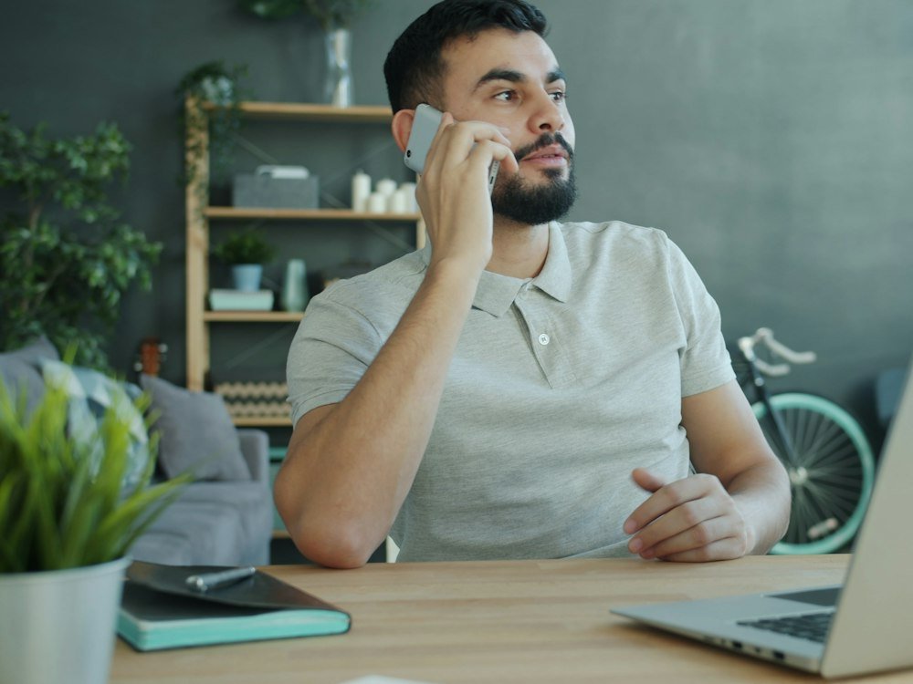 A recruiter on a phone call at a desk